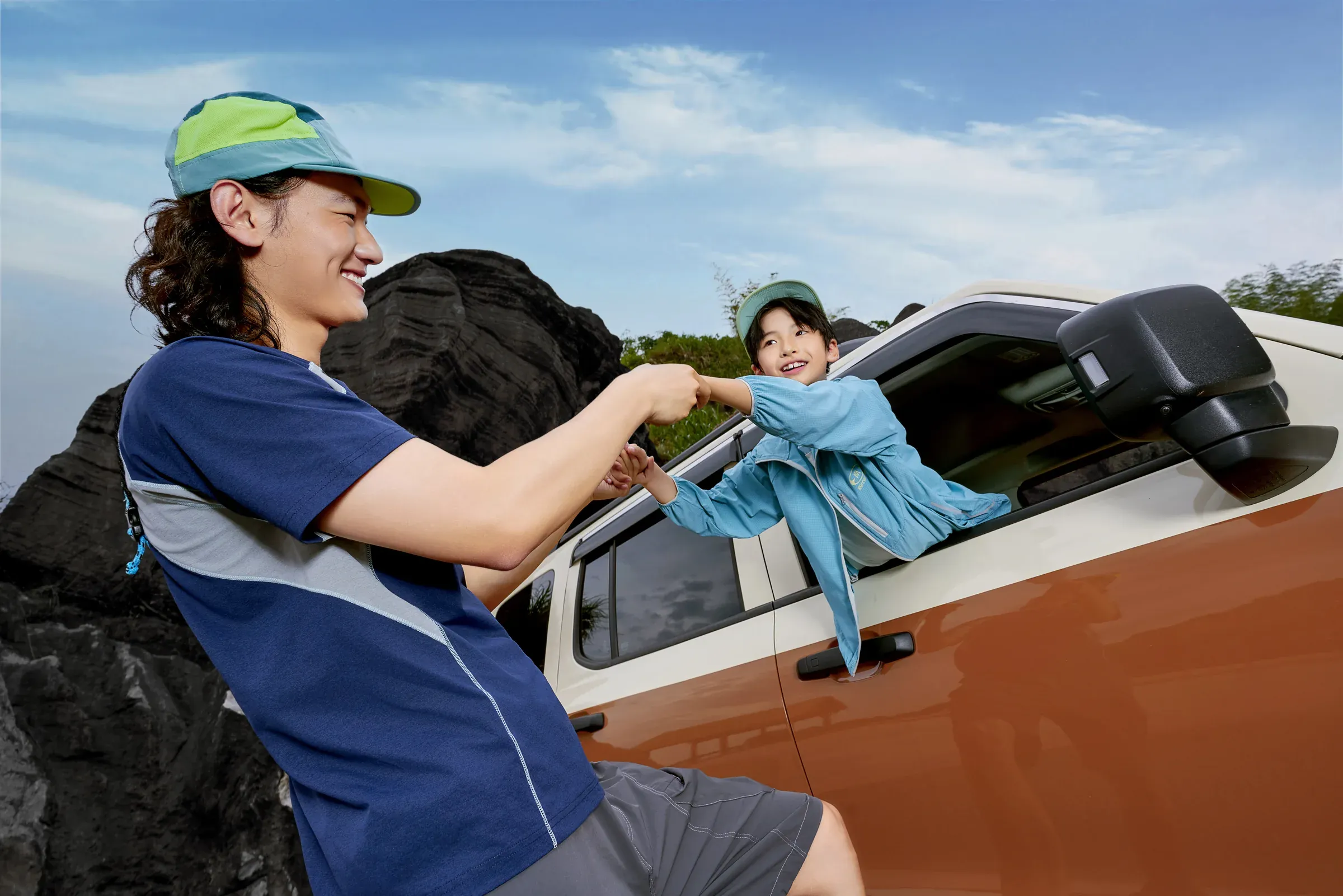 An adult and child beginning an outdoor road trip together